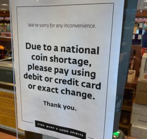 National Coin Shortage Notice at Retail store.